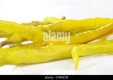 pickled chili peppers on a light background Stock Photo