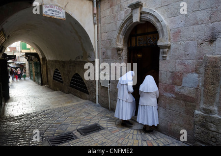 JERUSALEM, ISRAEL - April 6, 2012: Good Friday processions on the Way of the Cross. Jerusalem, Israel. Stock Photo