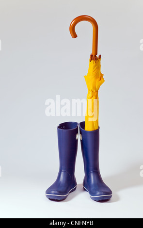 Download A Pair Of Yellow Rain Boots And A Umbrella On A White Background Stock Photo Alamy PSD Mockup Templates