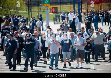 Thousands of fans arrive for the home opener at Yankee Stadium in the New York borough of The Bronx Stock Photo