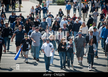 Thousands of fans arrive for the home opener at Yankee Stadium in the New York borough of The Bronx Stock Photo