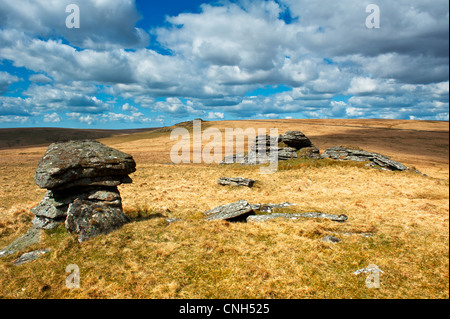 View looking out over Dartmoor from Beardown Tor towards the North Moor, Devil's Tor showing the granite rocky outcrops Stock Photo