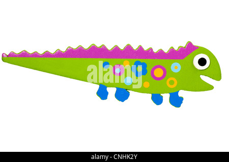 Close up of a green and purple toy lizard on white background Stock Photo