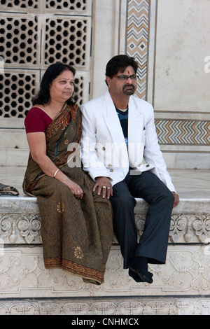 Agra, India. Taj Mahal. Indian Couple. Both wear a bindi on their foreheads. Stock Photo