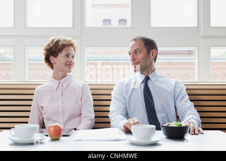 Business colleagues having lunch together Stock Photo