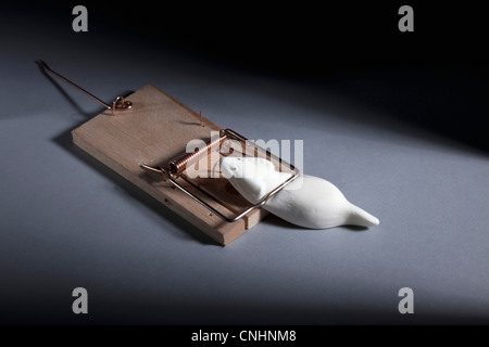A gummy candy mouse in a mousetrap Stock Photo
