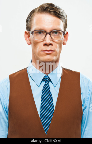 A retro looking man in a vest and shirt and tie Stock Photo