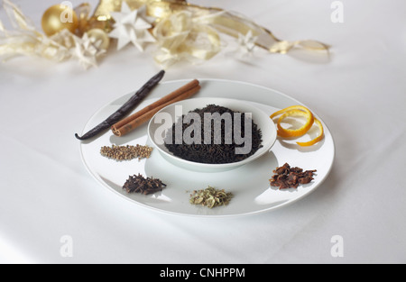 Tea and spices on plates Stock Photo