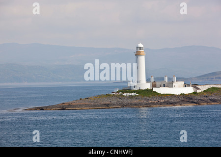 A white lighthouse from the Mull ferry near Oban, Scotland Stock Photo