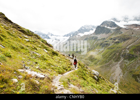 Family hiking in Alps, Tirol, Austria Stock Photo