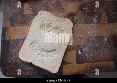 Good morning stamped into bread Stock Photo