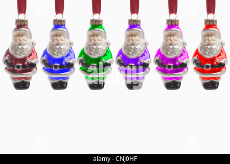 Six santa claus christmas decorations Stock Photo