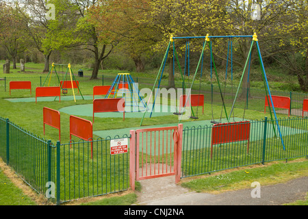 Empty colourful children's playground park area in Abergavenny, Wales UK. Stock Photo