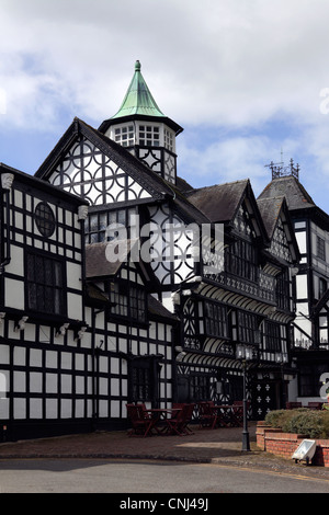 The Wild Boar Hotel in Tarporley,Cheshire.Although built in Tudor style it was in fact built in 1886 by local timber merchants. Stock Photo