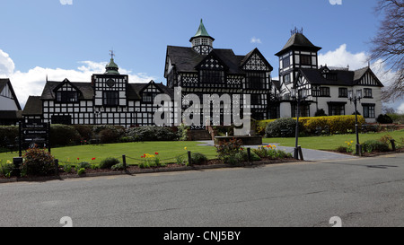 The Wild Boar Hotel in Tarporley,Cheshire.Although built in Tudor style it was in fact built in 1886 by local timber merchants. Stock Photo