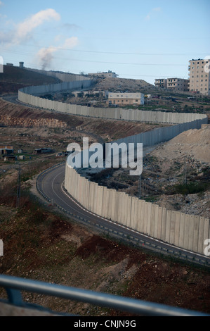 Middle East Israel  near Jerusalem separation wall fence to keep Palestinians apart  - settlements Stock Photo