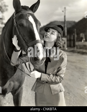 Beautiful Horse Woman Adoring Her Horse Stock Photo