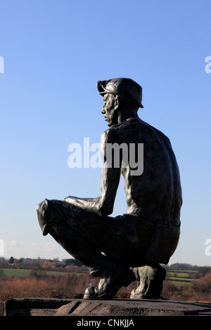 Betteshanger Kent UK. Statue of a Kent coal miner with miners hat and ...