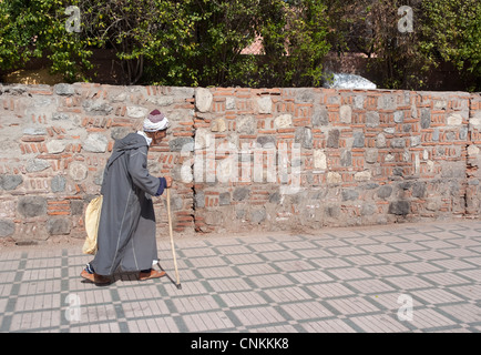elderly Moroccan man with a walking stick Stock Photo
