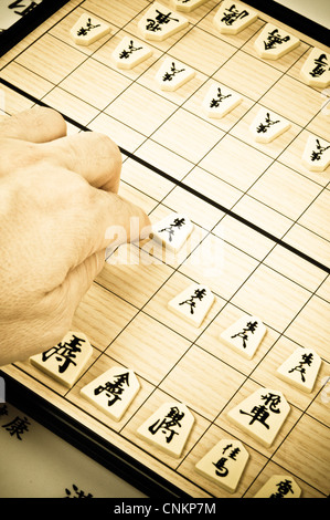 playing a game of Japanese chess, Shogi Stock Photo