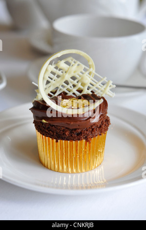 A Cake Served at Afternoon Tea, at The London Hilton Park Lane, London, England, UK Stock Photo