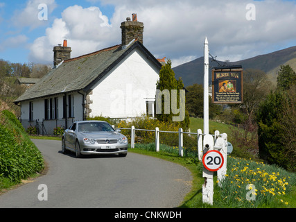 Sign for the Mortal Man pub in the village of Troutbeck, Lake District National Park, Cumbria, England UK Stock Photo