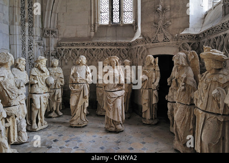 Sculptures at the chapel of the Holy Spirit / Chapelle du Saint-Esprit, in flamboyant gothic style at Rue, Picardy, France Stock Photo
