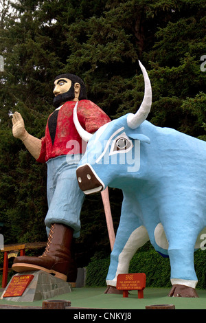 Paul Bunyan and Babe the Blue Ox statues at Trees of Mystery, a roadside attraction located in Klamath, California, USA. Stock Photo