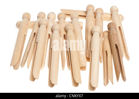 Pile of Dolly wooden clothes pegs Stock Photo