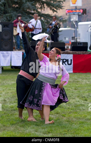 Peruvian dancers perform at the Trailing of the Sheep Festival in Hailey, Idaho, USA. Stock Photo