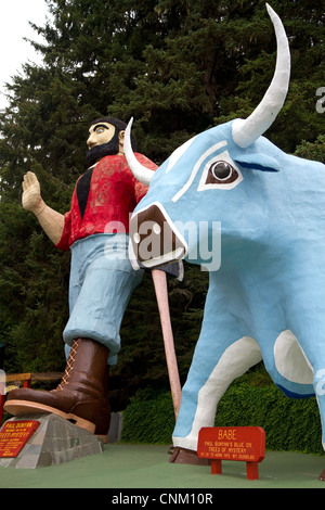 Paul Bunyan and Babe the Blue Ox statues at Trees of Mystery, a roadside attraction located in Klamath, California, USA. Stock Photo