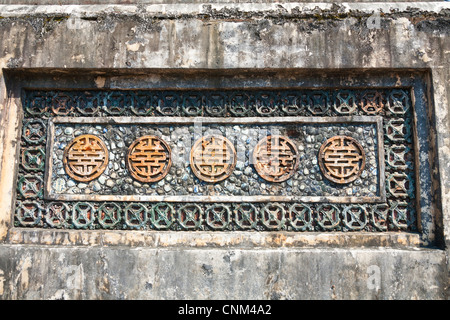 Detail on one of the two towers that flank the Stele Pavilion, at the tomb of Emperor Tu Duc, near Hue, Vietnam Stock Photo