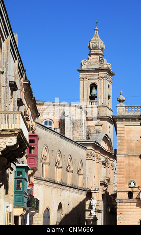 Carmelite church and Traditional stone buildings within Mdina, Malta, Europe Stock Photo