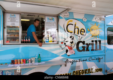 Miami Florida,Hialeah,Palm Avenue,Art on Palm,fair,festival,food truck,Hispanic man men male adult adults,small business,owner,mobile,Che Grill,Argent Stock Photo