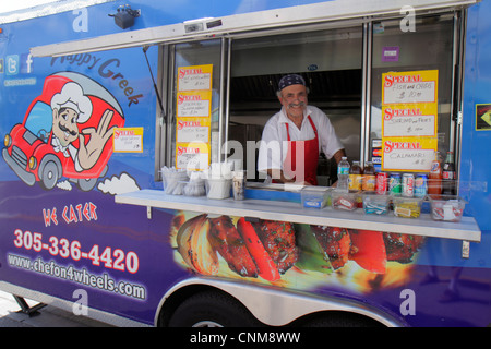 Miami Florida,Hialeah,Palm Avenue,Art on Palm,fair,festival,food truck,Greek,man men male adult adults,food,mobile small business,owner,smiling,happy, Stock Photo