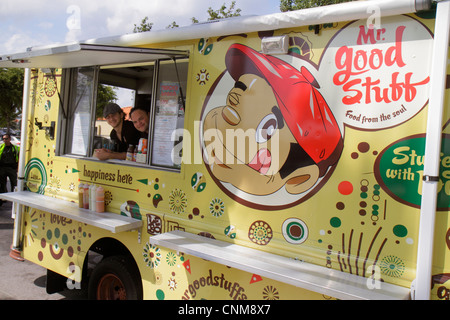 Miami Florida,Hialeah,Palm Avenue,Art on Palm,fair,festival,food truck,man men male adult adults,food,mobile small business,owner,smiling,happy,FL1203 Stock Photo