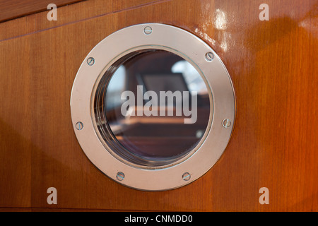 Porthole on a classic yacht Stock Photo