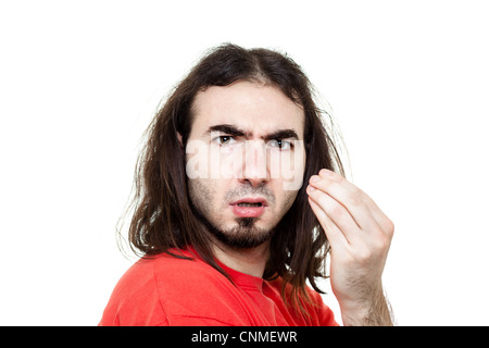 Disappointed Man with Red T-Shirt Isolated on White Stock Photo