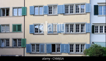 Small colored window shutters. Stock Photo
