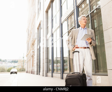 Businessman using tablet computer Stock Photo