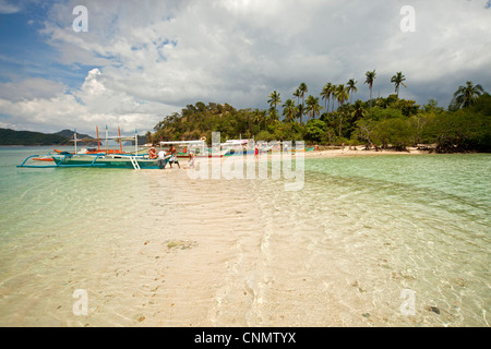 outrigger boats at Snake Island, Bacuit Bay, El Nido, Palawan, Philippines, Asia Stock Photo