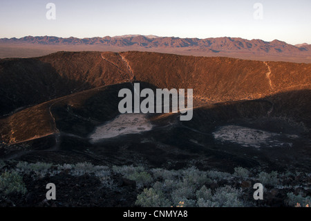View of extinct cinder cone volcano crater, Amboy Crater, Mojave Desert, California, U.S.A. Stock Photo