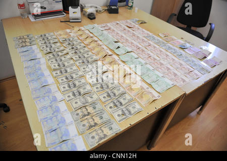 Counterfeit money displayed in police station in Bosnian capital Sarajevo. Stock Photo