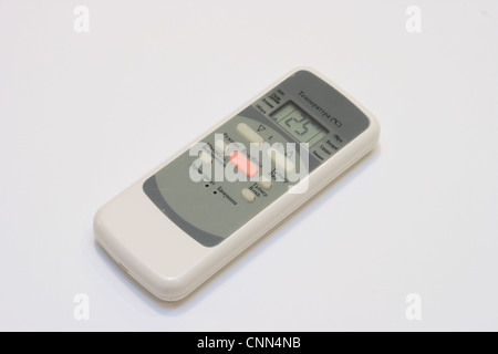 remote from the electronic air-conditioner. Isolated on white Stock Photo