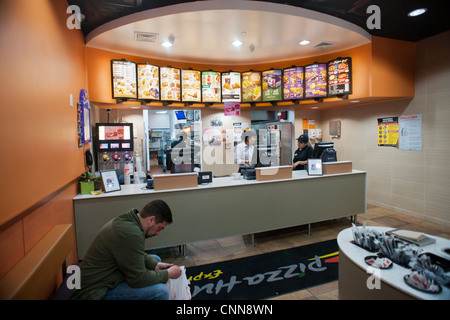 Taco Bell fast food restaurant in the Chelsea neighborhood of New York Stock Photo
