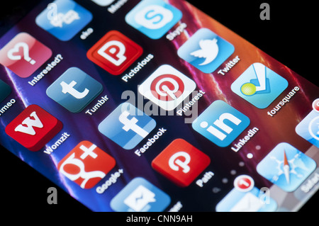 Apple iPhone screen showing various social media apps Stock Photo