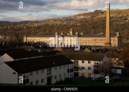 Salts Mill in Saltaire, looking down from Shipley, showing rows of terraced houses leading to the Mill. Stock Photo