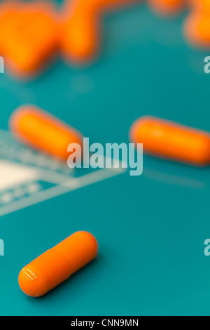 capsules on a counting tray in the pharmacy Stock Photo