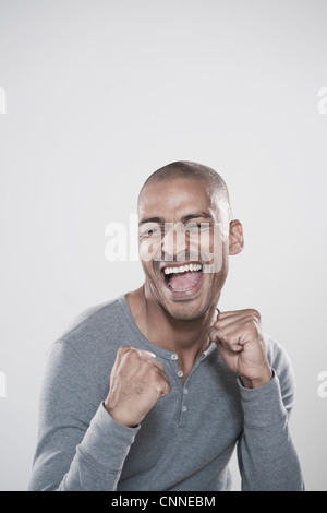 Portrait of Man Cheering Stock Photo