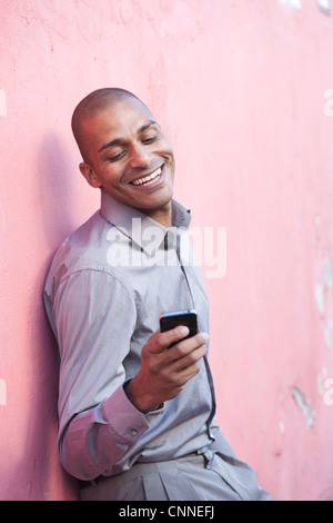 Man Looking at Cell Phone Stock Photo